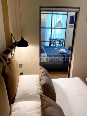 Letto o letti in una camera di Caprese Experience - Light Blu Apt - Dante