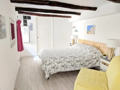 Letto o letti in una camera di B&B San Carlo