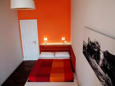 Letto o letti in una camera di Palazzo Mirelli
