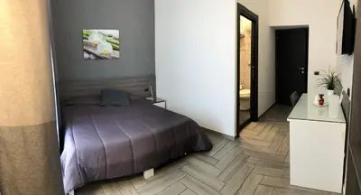 Letto o letti in una camera di La Dimora di Garibaldi