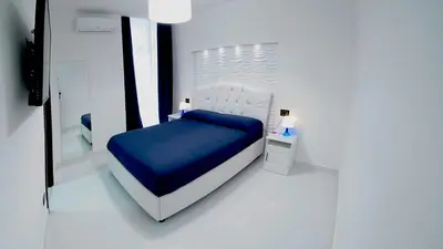 Letto o letti in una camera di Beverello Suite