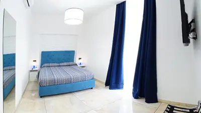 Letto o letti in una camera di Beverello Suite