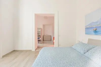 Letto o letti in una camera di In...Napoli B&B