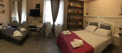 Letto o letti in una camera di Two Sisters Suites