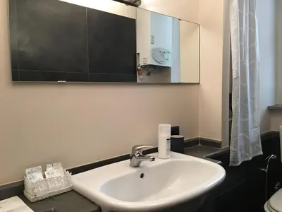 TV o dispositivi per l'intrattenimento presso Two Sisters Suites
