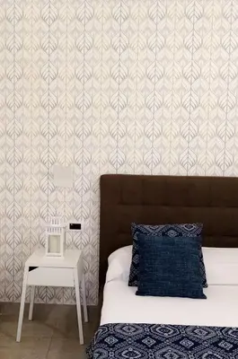 Letto o letti in una camera di Parthenope Suite
