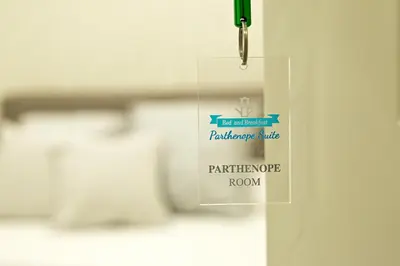 Letto o letti in una camera di Parthenope Suite