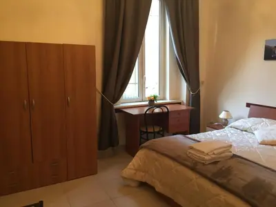 Letto o letti in una camera di La Piccola Reggia