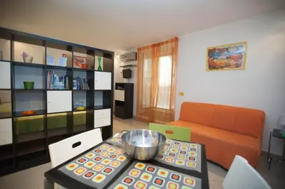 Area soggiorno di Serra Casa Vacanza a Piazza del Plebiscito