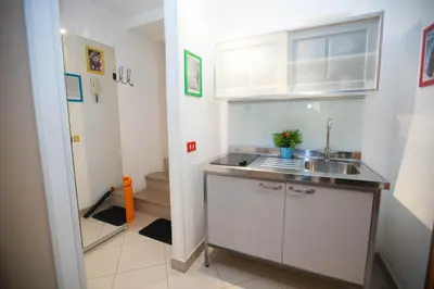 Cucina o angolo cottura di Serra Casa Vacanza a Piazza del Plebiscito
