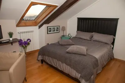 Letto o letti in una camera di Caesar Napoli