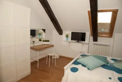 Letto o letti in una camera di Caesar Napoli