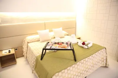 Letto o letti in una camera di Relais Piazza Del Plebiscito B&B