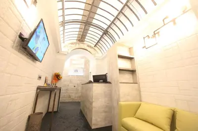 TV o dispositivi per l'intrattenimento presso Relais Piazza Del Plebiscito B&B