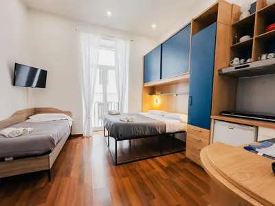 Letto o letti in una camera di Ale & Tizy House