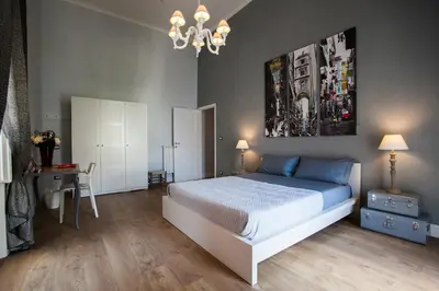 Letto o letti in una camera di Largo Donnaregina Home