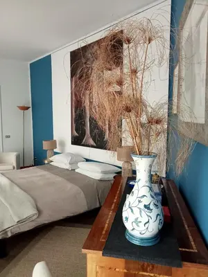 Letto o letti in una camera di Altera Domus