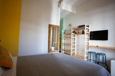 Letto o letti in una camera di Napoli Bonita b&b