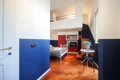 Letto o letti in una camera di Salotto Borbonico