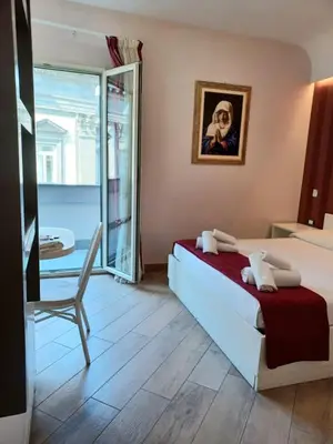 Letto o letti in una camera di B&B Federico II