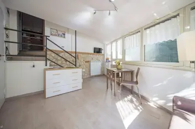 TV o dispositivi per l'intrattenimento presso GARDEN HOUSE Apartments in Naples