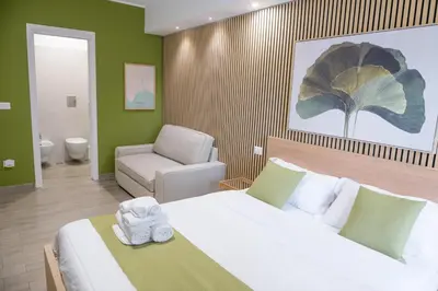 Letto o letti in una camera di Studio19