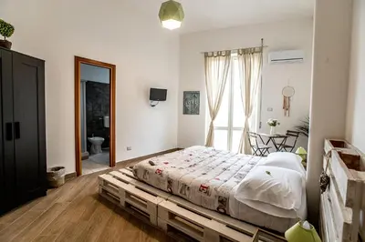 Letto o letti in una camera di Le Mura Antiche