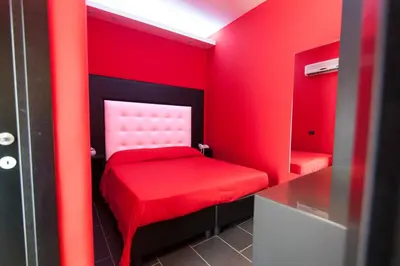 Letto o letti in una camera di Fly Boutique Hotel