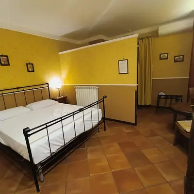 Letto o letti in una camera di Dependance