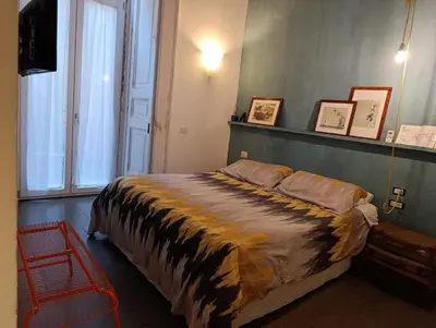 Letto o letti in una camera di B&B Montecalvario 41