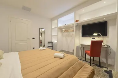 Letto o letti in una camera di Napoli Central City