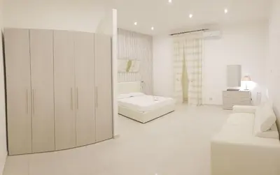 Letto o letti in una camera di Palazzo D'Atri