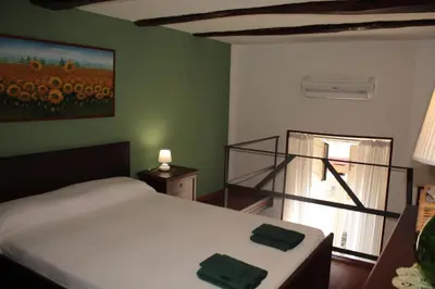 Letto o letti in una camera di Casa del Girasole
