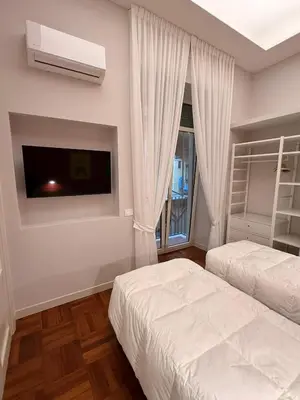 Letto o letti in una camera di Casa Amato