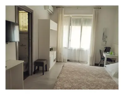 Letto o letti in una camera di B&B Carolina Napoli-Vomero
