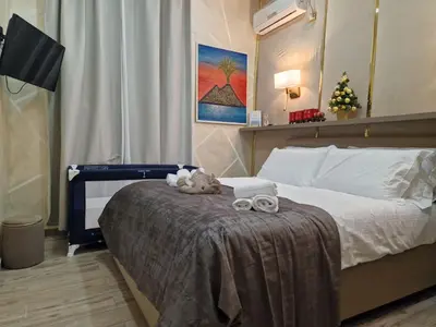 Letto o letti in una camera di La Dimora nei presepi in San Gregorio