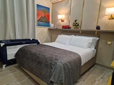 Letto o letti in una camera di La Dimora nei presepi in San Gregorio