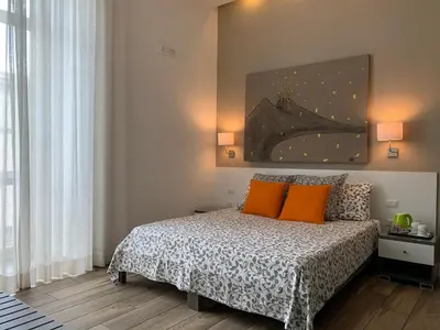 Letto o letti in una camera di B&B Casa Caracciolo