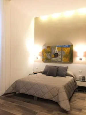 Letto o letti in una camera di B&B Casa Caracciolo