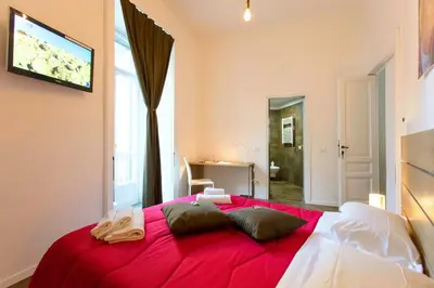 Letto o letti in una camera di B&B A Durmì