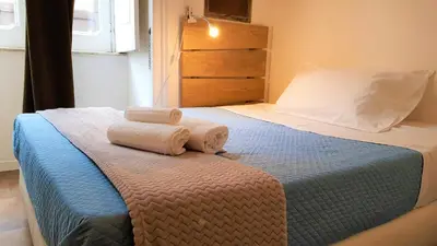Letto o letti in una camera di B&B A Durmì
