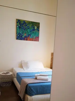 Letto o letti in una camera di B&B A Durmì