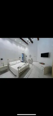 Letto o letti in una camera di Varriale Apartaments 2,0 free parking for small cars only