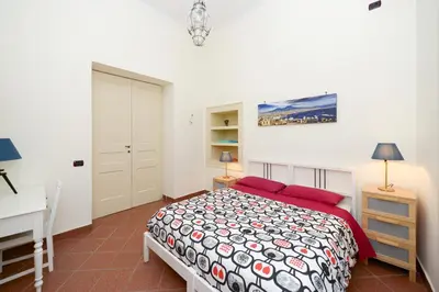 Letto o letti in una camera di Residenza Santa Chiara