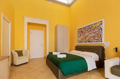 Letto o letti in una camera di Suites Trinità in Toledo street