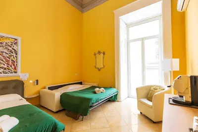 Letto o letti in una camera di Suites Trinità in Toledo street