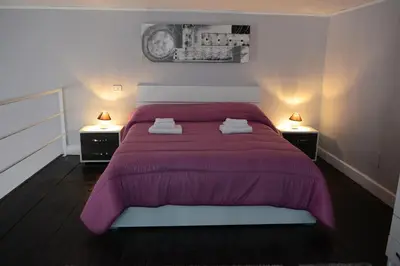 Letto o letti in una camera di B&B La Torretta Chiaia