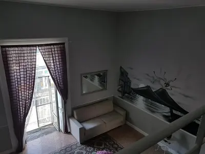 Letto o letti in una camera di B&B La Torretta Chiaia