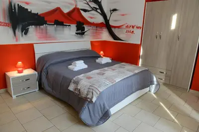 Letto o letti in una camera di B&B La Torretta Chiaia