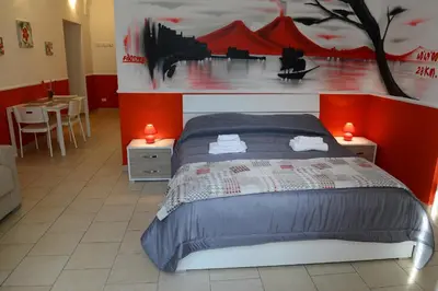 Letto o letti in una camera di B&B La Torretta Chiaia